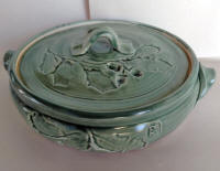 Blue-green glaze on casserole with Live Oak imprint.